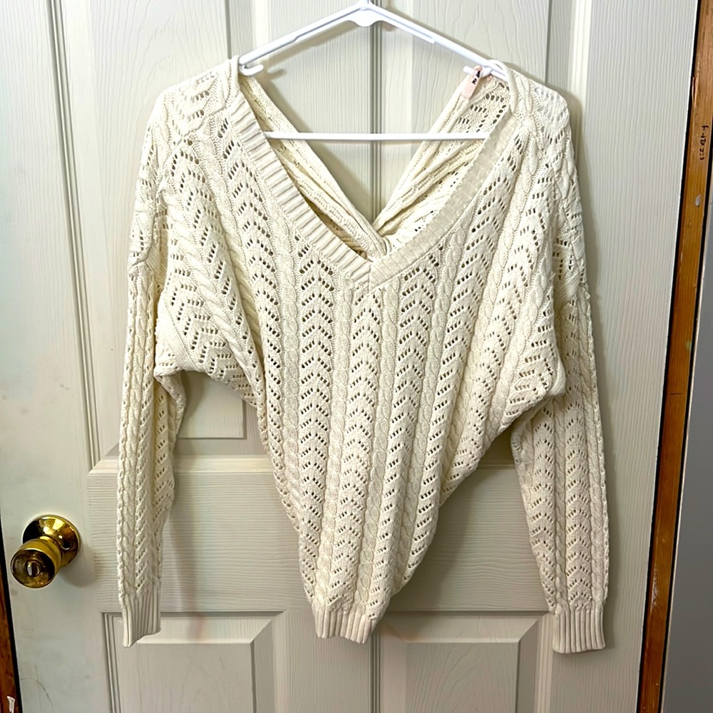 White knit sweater with knot back